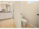 Clean bathroom features a double sink vanity, tiled floors, and a walk-in shower at 8055 Navajo River Loop # B, Littleton, CO 80125