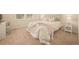 Bright bedroom with a cozy bed, a desk, and lots of light at 8055 Navajo River Loop # B, Littleton, CO 80125