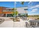 Modern community center featuring outdoor seating, landscaping, and bike parking at 8055 Navajo River Loop # B, Littleton, CO 80125