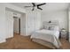 Comfortable bedroom with neutral colors, a ceiling fan, and carpet flooring at 8187 Martin Luther King Blvd, Denver, CO 80238
