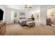 Large bedroom with a ceiling fan, decor and access to a private deck and bathroom at 10142 S Turkey Creek Rd, Morrison, CO 80465