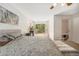 Large main bedroom with access to a private deck and bathroom with a soaking tub at 10142 S Turkey Creek Rd, Morrison, CO 80465