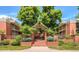 A beautiful brick condo complex with lush landscaping and mature trees in a desirable location at 625 Pearl St # 23, Boulder, CO 80302