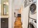 Hallway with washer and dryer, leading to the living area at 625 Pearl St # 23, Boulder, CO 80302