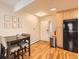 Cozy eat-in kitchen with wood floors and stainless steel refrigerator at 625 Pearl St # 23, Boulder, CO 80302