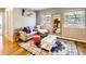 Inviting living room with bright windows, hardwood floors, stylish decor, and a comfortable seating area at 625 Pearl St # 23, Boulder, CO 80302