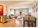 Bright open-concept living and dining area with hardwood floors and stylish decor at 625 Pearl St # 23, Boulder, CO 80302