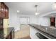 Basement bar features a granite countertop and wine storage at 150 Harrison St, Denver, CO 80206