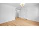 Light and airy hallway with hardwood floors and access to bedrooms at 150 Harrison St, Denver, CO 80206