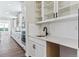 Bright kitchen with modern white cabinets, subway tile backsplash, and stainless steel appliances at 4728 Twelve Oaks Way, Castle Rock, CO 80104