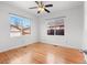 Bright bedroom boasting hardwood floors and two large windows at 1561 Newton St, Denver, CO 80204