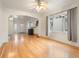 Spacious living room with hardwood floors, fireplace, and abundant natural light at 1561 Newton St, Denver, CO 80204