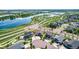Beautiful aerial view of a lakeside community with well-maintained homes and scenic surroundings at 12513 Shore Point St, Firestone, CO 80504