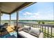 Open balcony showcasing water views and seating arrangements at 12513 Shore Point St, Firestone, CO 80504