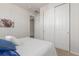 Bright bedroom with closet space and plush carpeting, ensuring maximum comfort at 12513 Shore Point St, Firestone, CO 80504