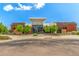 Modern clubhouse with landscaping, bike racks, and ample parking at 12513 Shore Point St, Firestone, CO 80504