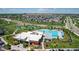 Resort-style living with a community pool, clubhouse, and well-manicured lawns at 12513 Shore Point St, Firestone, CO 80504