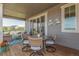 Outdoor patio featuring comfortable seating and a table for dining at 12513 Shore Point St, Firestone, CO 80504