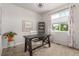 Home office with natural light and comfortable carpeting at 12513 Shore Point St, Firestone, CO 80504
