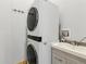 Laundry area features washer and dryer combo with sink at 2650 W Asbury Ave, Denver, CO 80219