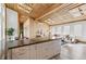 Open-concept living space showcases a modern kitchen flowing into a comfortable living room at 2650 W Asbury Ave, Denver, CO 80219
