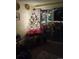 Bright living room with a Christmas tree and patio doors at 1300 S Parker Rd # 305, Denver, CO 80231