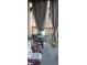 Relaxing patio with seating and string lights at 1300 S Parker Rd # 305, Denver, CO 80231