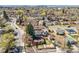Aerial view of the property and neighborhood showing the home's location and surrounding landscape at 5611 E 13Th Ave, Denver, CO 80220
