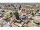 Aerial view showcasing the property's backyard, landscaping, and proximity to nearby amenities at 5611 E 13Th Ave, Denver, CO 80220
