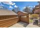 Cozy fenced back patio with air conditioning unit providing a private outdoor space at 8040 Holland Ct # C, Arvada, CO 80005