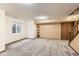 Finished basement with carpet flooring, a window, and a closet at 8040 Holland Ct # C, Arvada, CO 80005