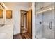 Updated bathroom featuring a glass shower and modern vanity at 8040 Holland Ct # C, Arvada, CO 80005
