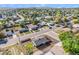 Aerial view of a residential neighborhood with tree-lined streets and a mix of single-Gathering homes on spacious lots at 7450 Granada Rd, Denver, CO 80221