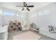 Bright bedroom featuring a play area, colorful storage, and a teepee for a -friendly space at 7450 Granada Rd, Denver, CO 80221