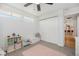 Bright bedroom with neutral tones, featuring a closet and space for a bed and storage, perfect for a room at 7450 Granada Rd, Denver, CO 80221