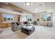 Finished basement featuring neutral colors, lots of space for entertaining, and great natural light at 10145 Meadow Run, Parker, CO 80134