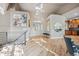 Welcoming entryway boasting high ceilings, modern lighting, and hardwood floors leading into the home at 10145 Meadow Run, Parker, CO 80134