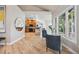 Open-concept kitchen showcasing stainless steel appliances, custom cabinetry, and natural light at 10145 Meadow Run, Parker, CO 80134