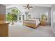Light-filled main bedroom with high ceilings, large windows, and a spacious layout at 10145 Meadow Run, Parker, CO 80134