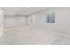 Spacious finished basement with recessed lighting and two egress windows at 21097 E 62Nd Dr, Aurora, CO 80019