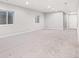 Finished basement with recessed lighting and egress window at 21097 E 62Nd Dr, Aurora, CO 80019