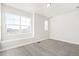Bright bedroom with large windows offering neighborhood views at 21097 E 62Nd Dr, Aurora, CO 80019