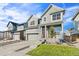 Charming two-story home with an attached two car garage at 21097 E 62Nd Dr, Aurora, CO 80019