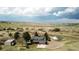 Stunning aerial view of a home nestled on acreage featuring a separate building at 10554 Tanglewood Rd, Franktown, CO 80116