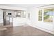 Bright and open-concept living space connecting seamlessly to the kitchen and dining area at 10554 Tanglewood Rd, Franktown, CO 80116