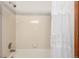 Bathroom with a tiled shower and a decorative curtain at 7768 Xavier Ct, Westminster, CO 80030