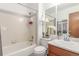 Bathroom with a tiled shower and vanity with sink at 7768 Xavier Ct, Westminster, CO 80030