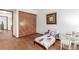 Bedroom with bed, desk, and closet at 7768 Xavier Ct, Westminster, CO 80030