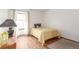 Bedroom featuring a bed with wood-look floors and natural light at 7768 Xavier Ct, Westminster, CO 80030