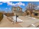 Charming two-story home with a two-car garage and beautifully landscaped front yard, featuring a mailbox and rock border at 7768 Xavier Ct, Westminster, CO 80030